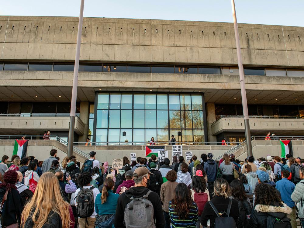 People chant and hold signs during a rally in support of Palestinians at MIT in Cambridge, Massachusetts on October 19.