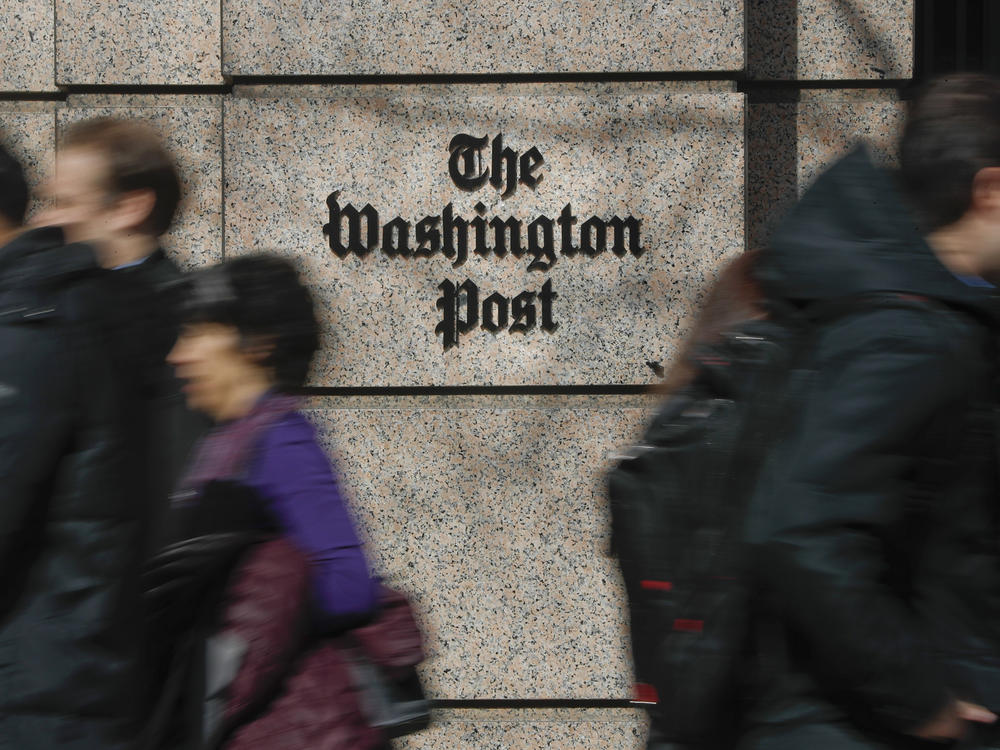 More than 750 <em>Washington Post</em> workers have agreed to walk off the job on Thursday to protest stalled contract negotiations. The company has warned of layoffs if too few staffers take voluntary buyouts.