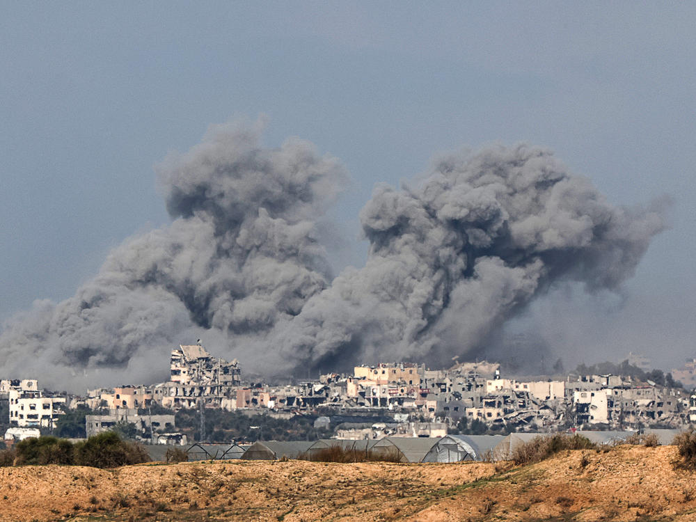 A photo taken from southern Israel near the border with the Gaza Strip on Wednesday, shows smoke billowing during an Israeli bombardment in Gaza amid continuing battles between Israel and the militant group Hamas.