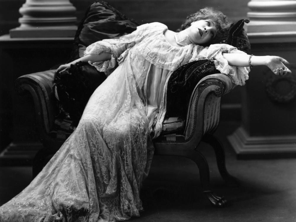 Stage actress Sarah Bernhardt (1844-1923) reclines in a scene from an unnamed theater production.