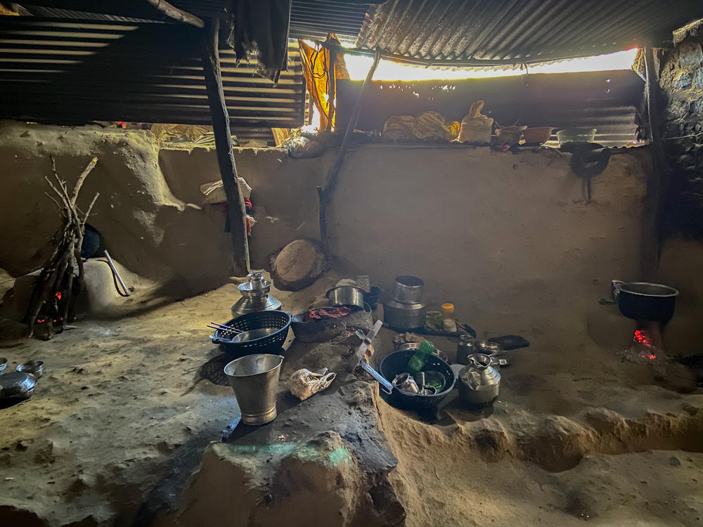 The home of a farm worker's family in India's Dharur village. Droughts and crop failures over recent years have made it harder to earn a living.