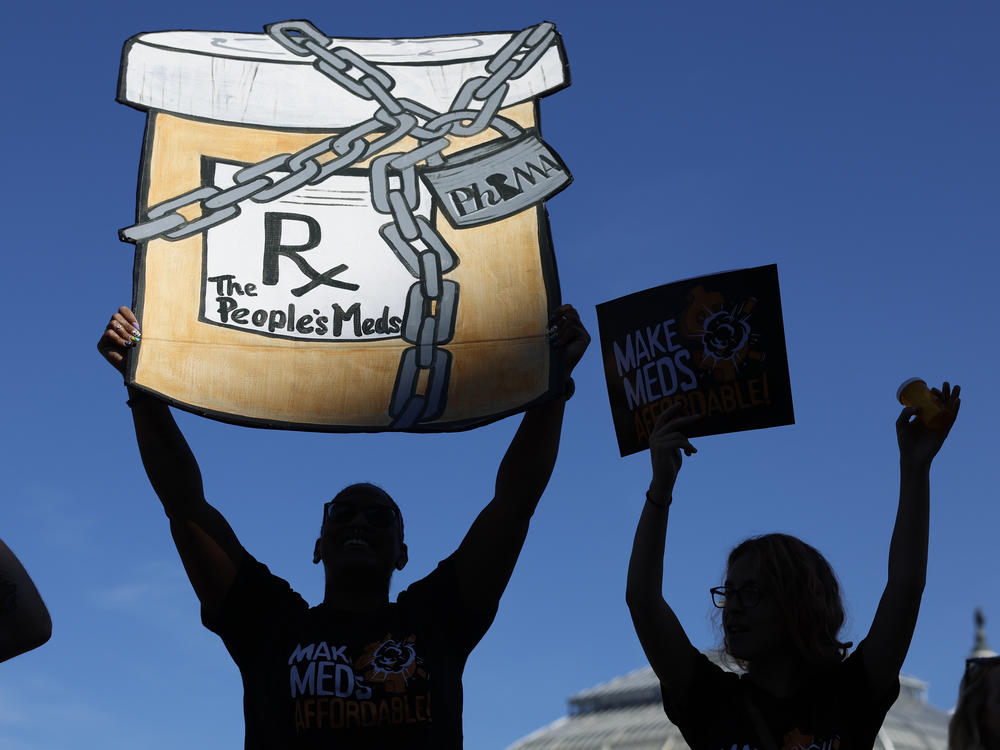 Activists protest the prices of prescription drug outside the Department of Health and Human Services in Washington, D.C., in October 2022.