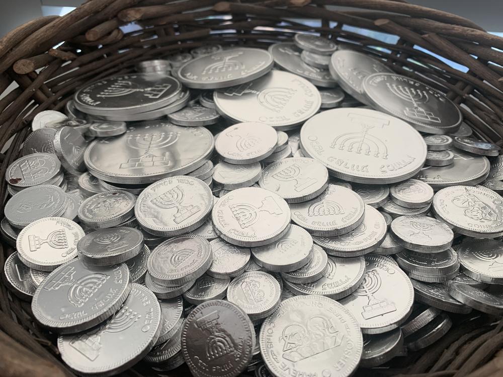 Gelt are chocolate coins traditionally given out during Hanukkah. NuRoots, the Jewish Federation of Greater Los Angeles' young adult initiative, has baskets of gelt to hand out at its events.
