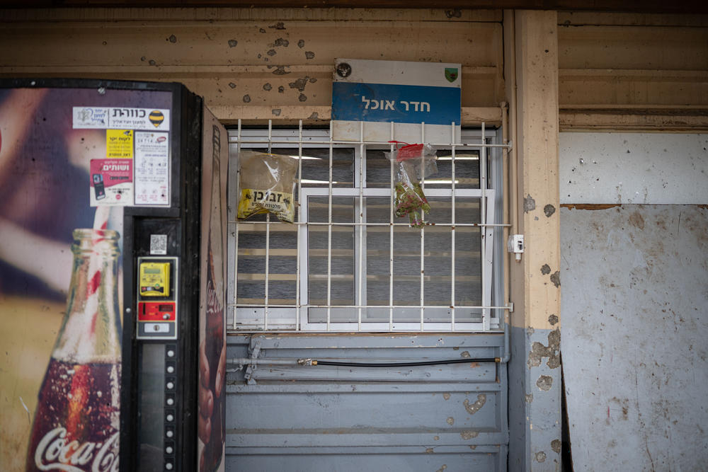 Shrapnel marks are seen on a building damaged by a Hezbollah strike on an Israeli military base near the border with Lebanon in northern Israel on Nov. 28.
