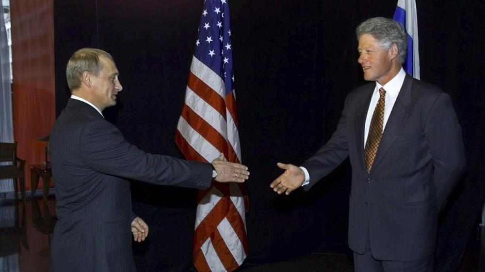 President Clinton greets Russia's then-new Prime Minister Vladimir Putin in Auckland, New Zealand in 1999.