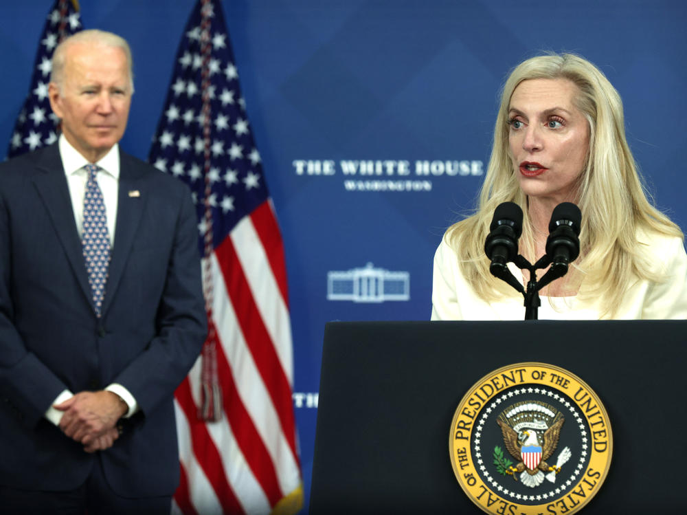 Lael Brainard speaks as President Joe Biden listens during an announcement in Nov. 2021.
