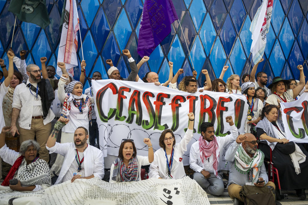 Participants shout slogans during a demonstration demanding a ceasefire in the Israel-Hamas war.