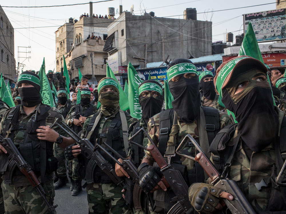 Palestinian Hamas militants are seen during an event in the Bani Suheila district of Gaza City, Gaza Strip, on July 20, 2017.