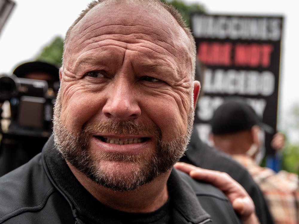 Infowars founder Alex Jones interacts with supporters at the Texas State Capital building on April 18, 2020, in Austin.