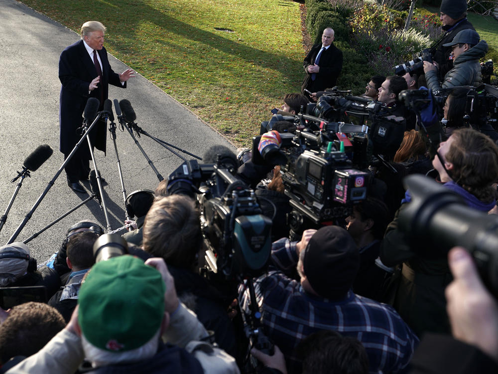 Donald Trump speaks to members of the media in November 2018.