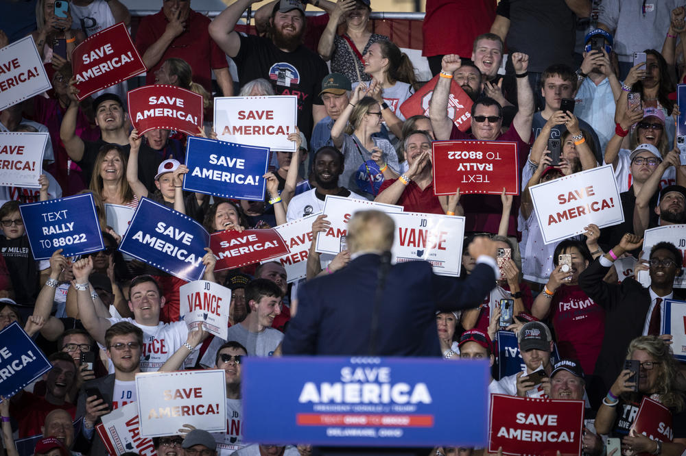 Trump gestures to the crowd after speaking during a rally in 2022.