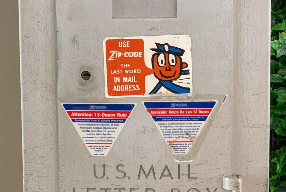 A Mr. ZIP decal appears on a U.S. mail letter box in Florida in 2019. The character was part of a campaign to promote the use of ZIP codes, which were introduced in 1963, 60 years ago.