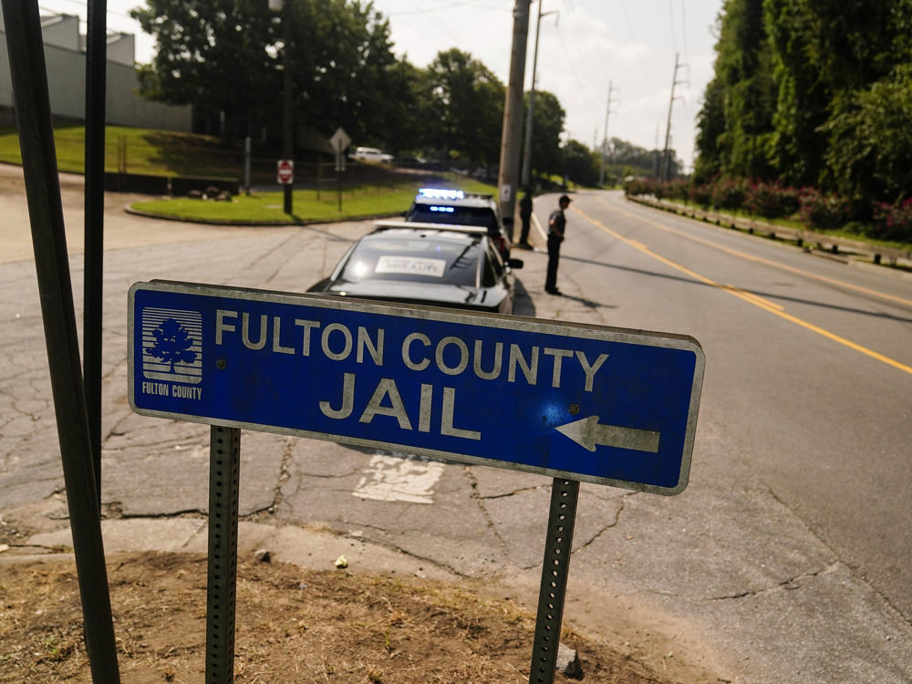 A Fulton County Jail signs in Atlanta. The number of people in jail who were Black increased 6% from 2021 to 2022, the BJS report said.