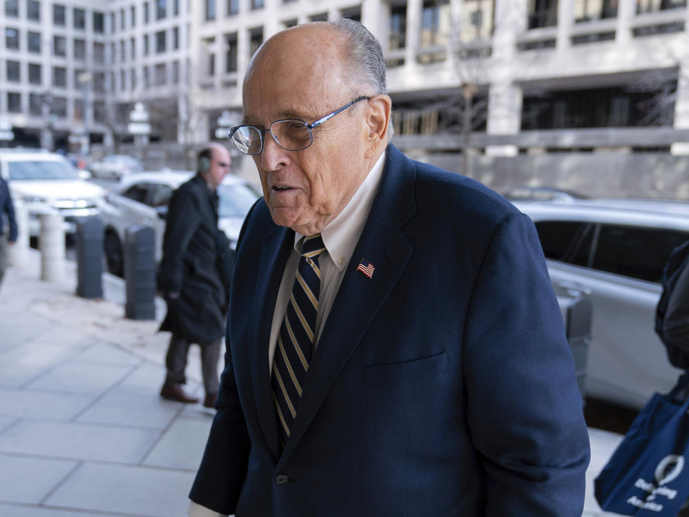Rudy Giuliani arrives at the federal courthouse in Washington, D.C., on Wednesday for a trial to determine how much he will have to pay two 2020 Georgia election workers who he falsely accused of fraud.