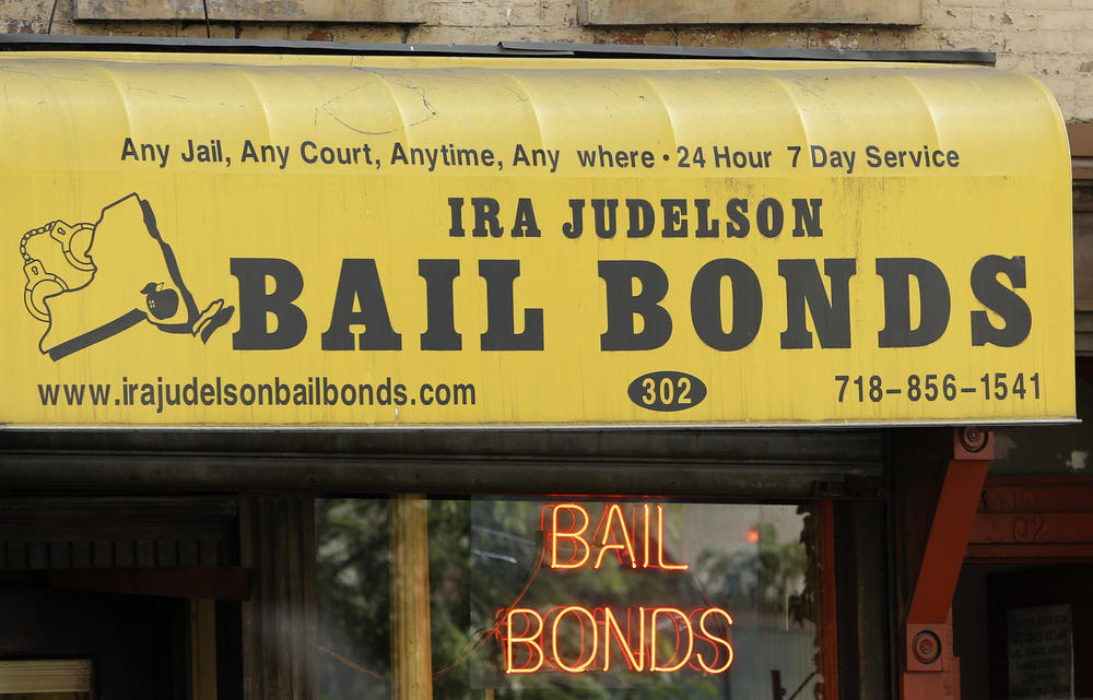 A bail bonds business is shown New York in 2015. Researchers say unaffordable bail levels mean more people are remaining behind bars in local jails.