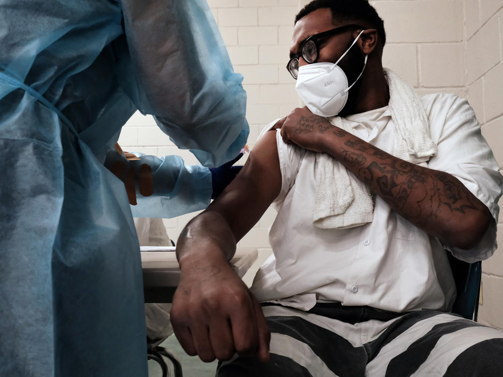 A prisoner at the Bolivar County Correctional Facility receives a Covid-19 vaccination in April 2021 in Cleveland, Miss. During the pandemic, jails and prisons released thousands of inmates.