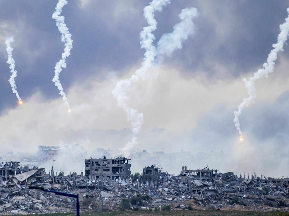 Smoke billows after an Israeli strike on north Gaza on November 22, 2023. Israel says it is using artificial intelligence to find targets.