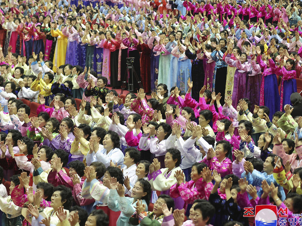 This photo provided by the North Korean government, North Korean women attend the National Mothers' Meeting in Pyongyang, North Korea on Dec. 3, 2023. The content of this image is as provided and cannot be independently verified.