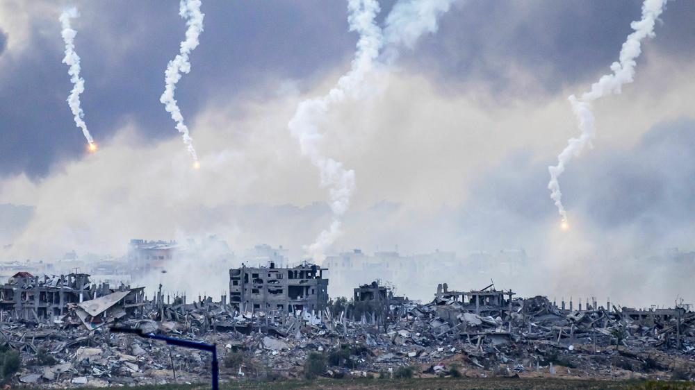 Smoke billows after an Israeli strike on north Gaza on November 22, 2023. Israel says it is using artificial intelligence to find targets.