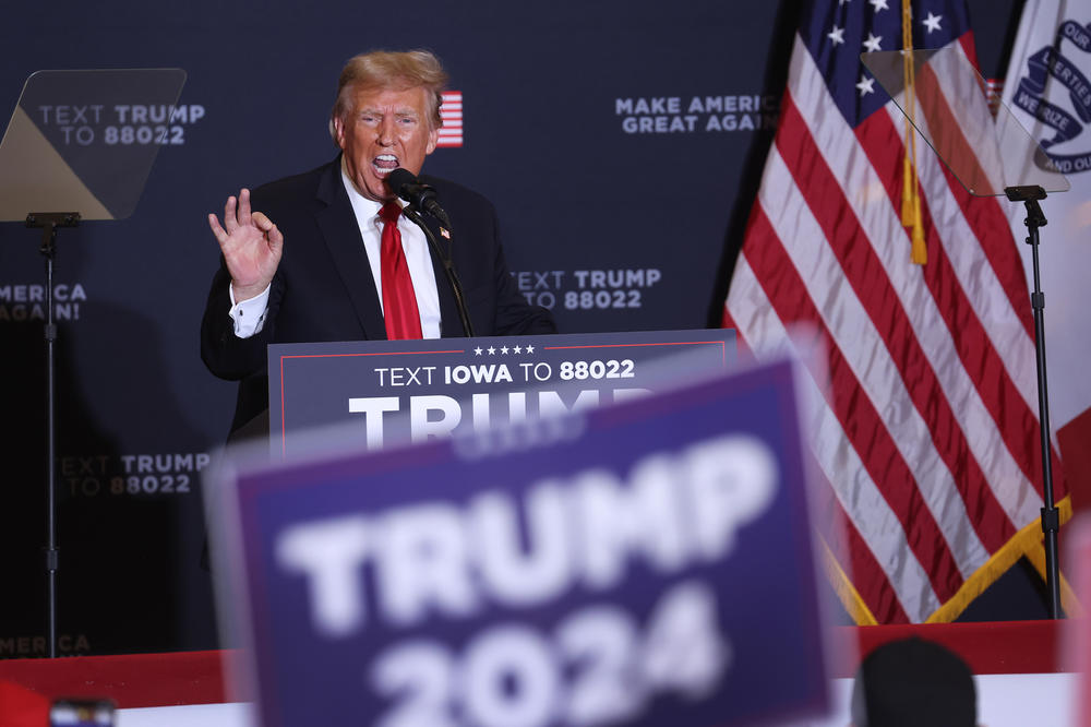 Republican presidential candidate and former President Donald Trump speaks during a campaign event at the Hyatt Hotel on Dec. 13 in Coralville, Iowa.