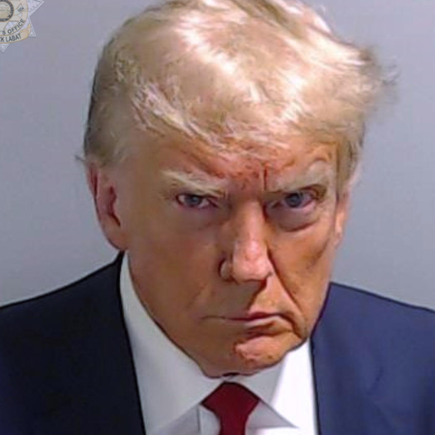 This booking photo provided by the Fulton County Sheriff's Office shows former President Donald Trump on Aug. 24 after he surrendered and was booked at the Fulton County Jail in Atlanta. Trump is accused by Fulton County District Attorney Fani Willis of attempting to subvert the will of Georgia voters in a bid to keep Joe Biden out of the White House.