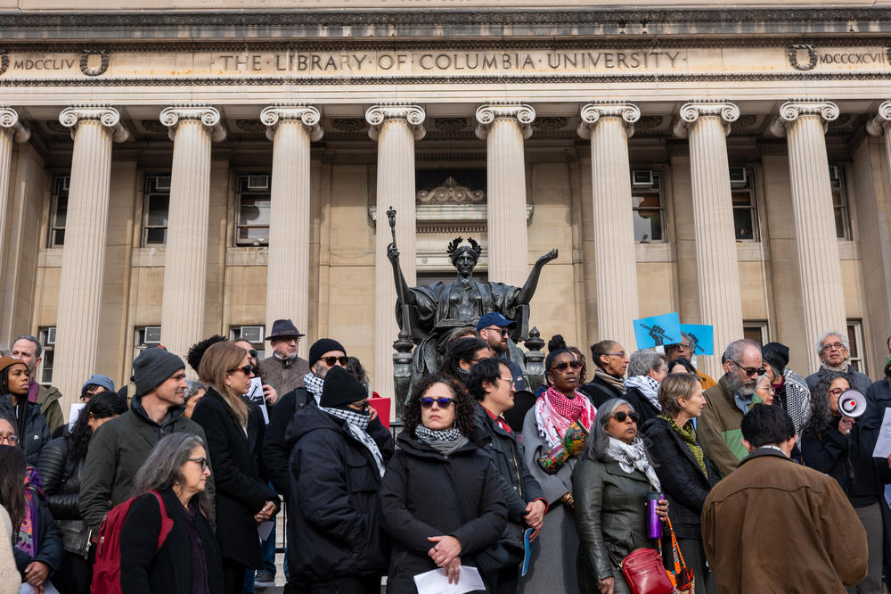 Members of Columbia University's faculty hold a protest in support of free speech on the Columbia University campus in November.
