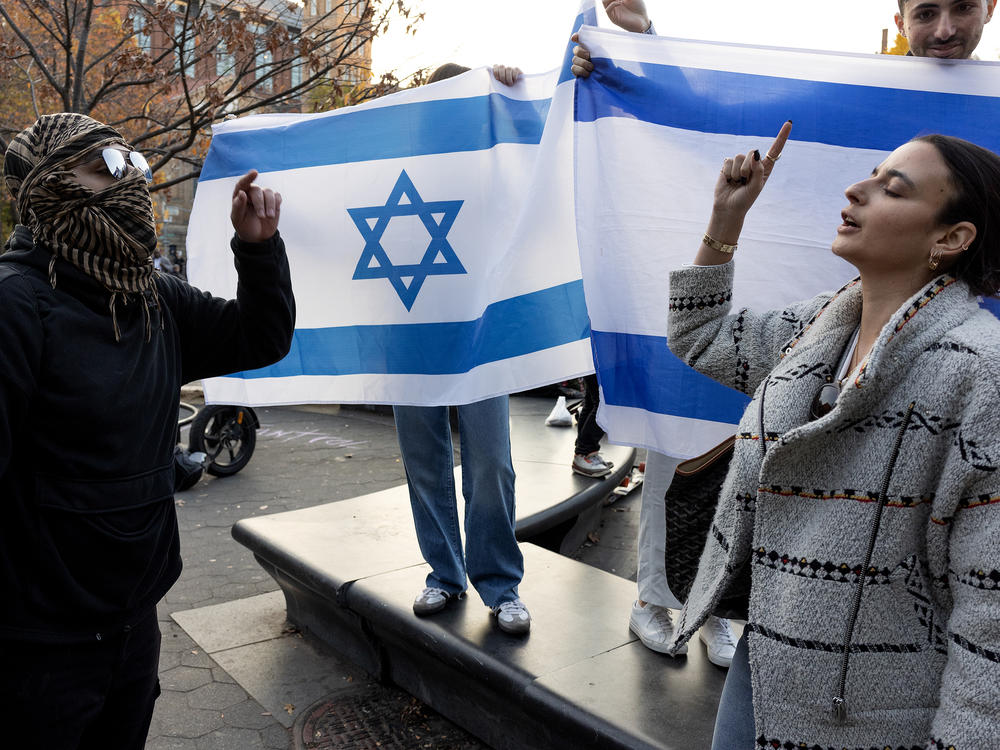 Pro-Palestinian and pro-Israeli supporters converge at a demonstration of New York University students in November.