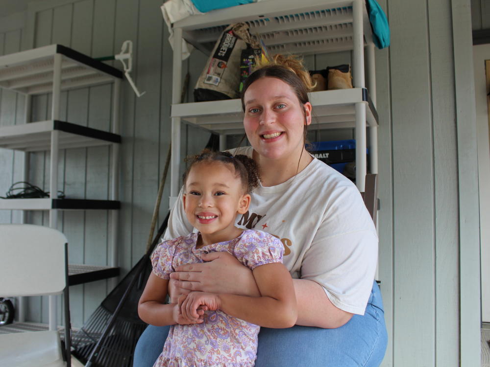 Kenadie Evans with her 3-year-old, Khloe Johnson, at their new home in southeastern Georgia. Evans is pregnant and says she intentionally chose Dr. Zita Magloire to manage her delivery.