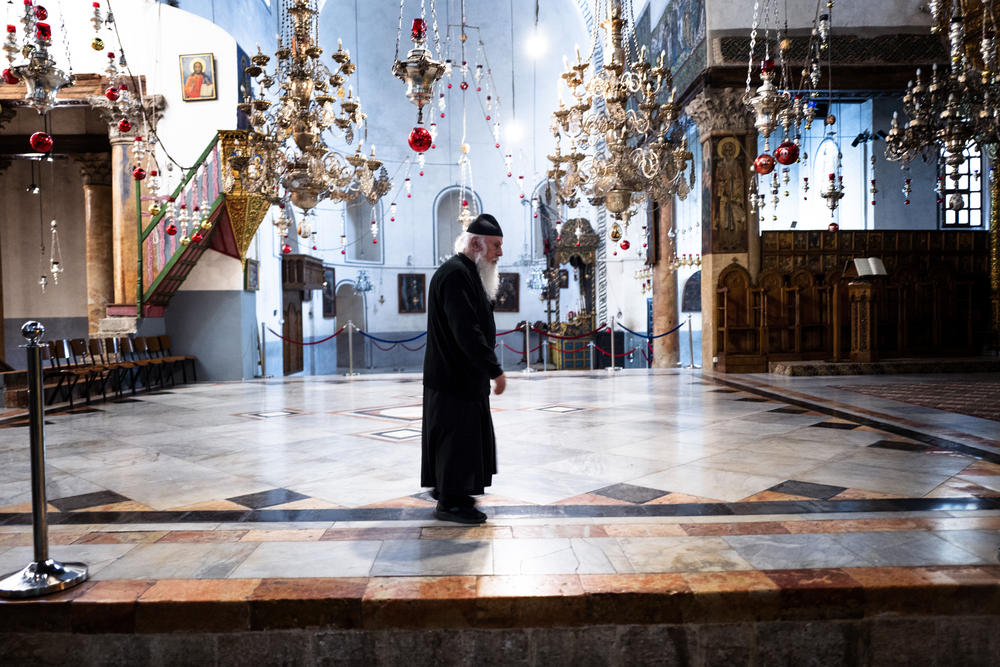 Inside the Church of the Nativity. The church is typically packed with visitors each December. But now, it's nearly empty.