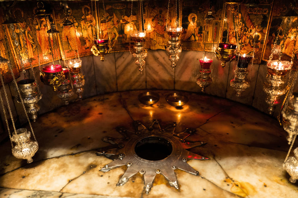 A silver star inside the famous grotto at the Church of the Nativity marks the exact location where Christians believe Jesus was born.