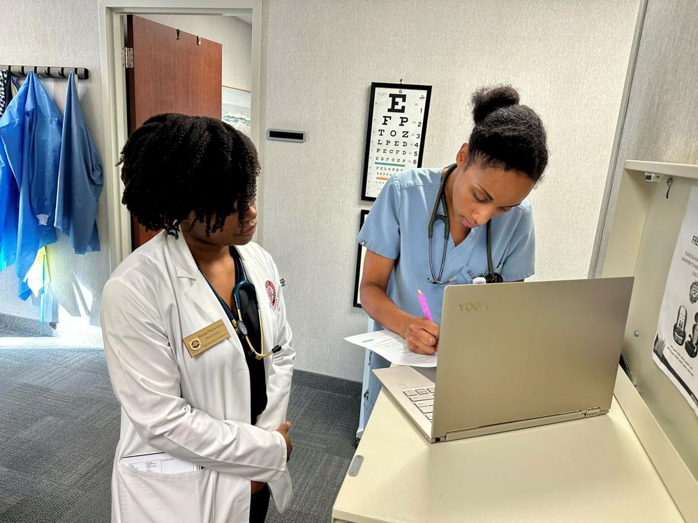 Kaniya Pierre Louis (left) is a third-year medical student shadowing Dr. Zita Magloire for the day. Pierre Louis says she appreciates Magloire as a role model and an example of excellence.