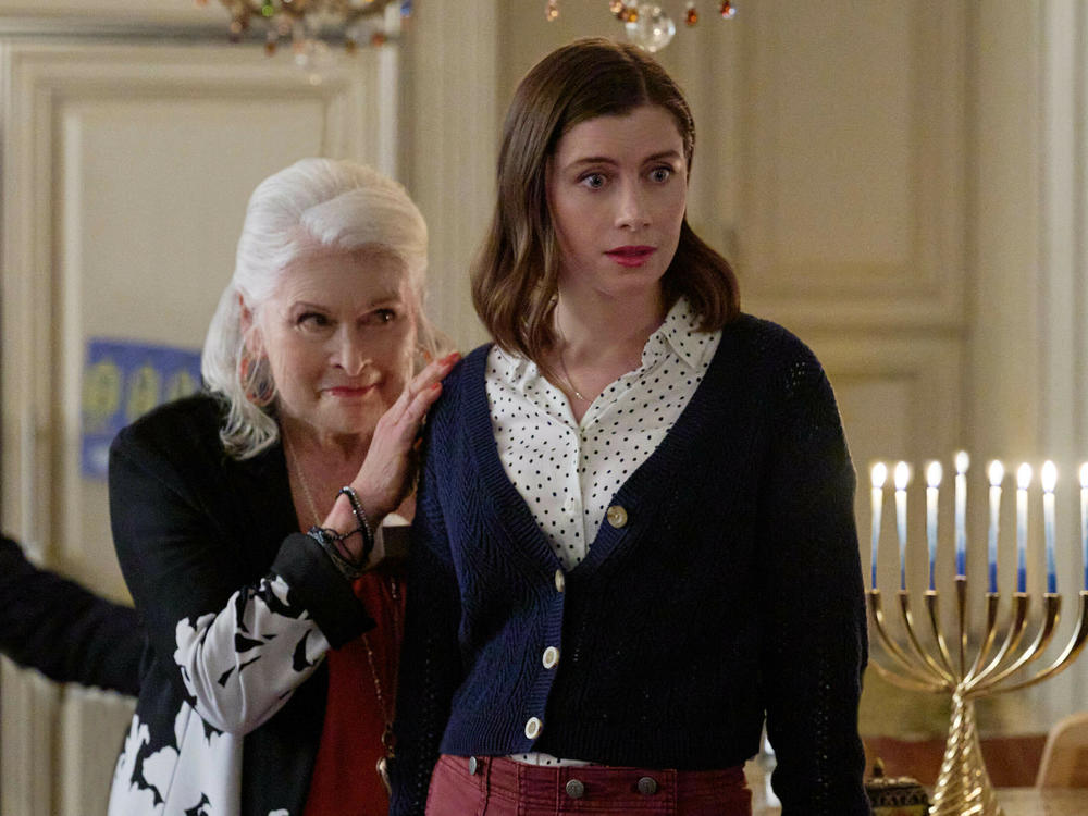 If you find yourself in Hanukkah withdrawal, take <em>Round and Round</em> for a spin: This time-loop romance embraces the holiday in a way that feels complete and thoughtful. Above, Paula Shaw and Vic Michaelis in <em>Round and Round.</em>