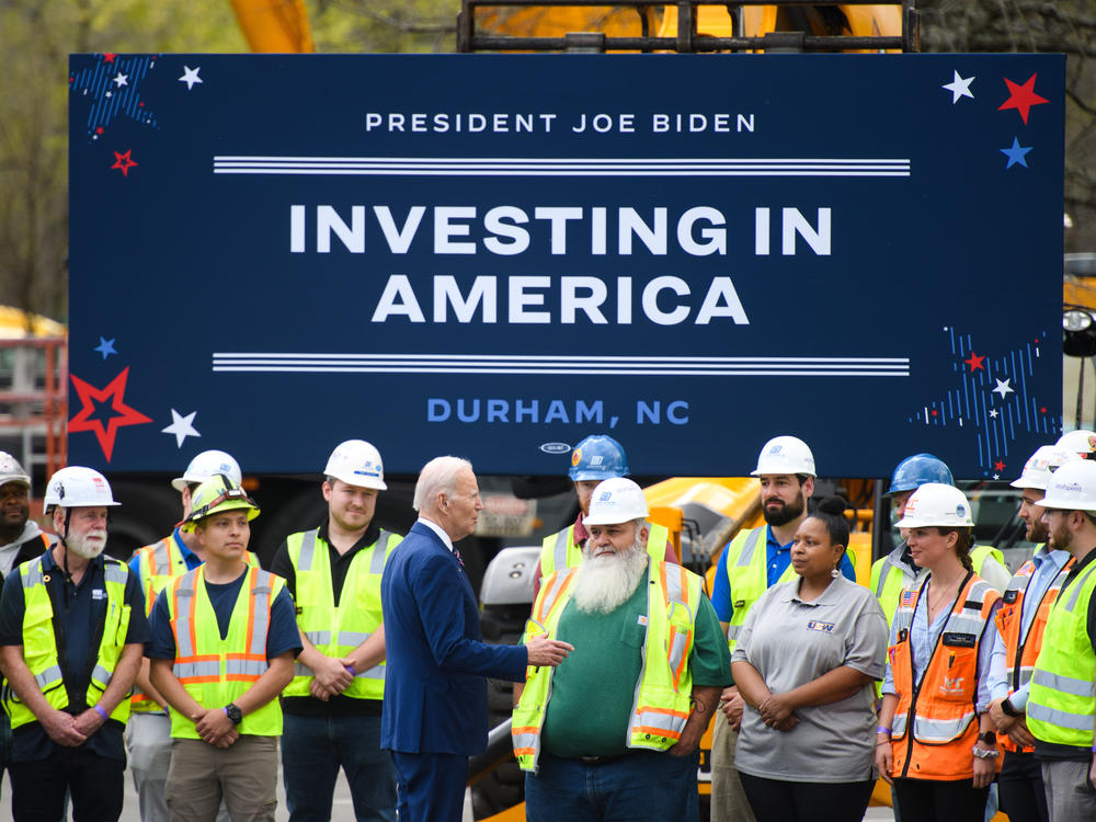 President Biden greets workers after a visit to Wolfspeed, a semiconductor manufacturer in Durham, N.C., on March 28, 2023.