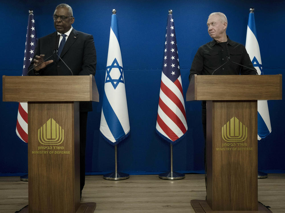 Israel Minister of Defense Yoav Gallant, right, listens to his U.S. counterpart, Secretary of Defense Lloyd Austin, as he briefs reporters after their meeting about Israel's military operation in Gaza, in Tel Aviv, Israel, on Monday.