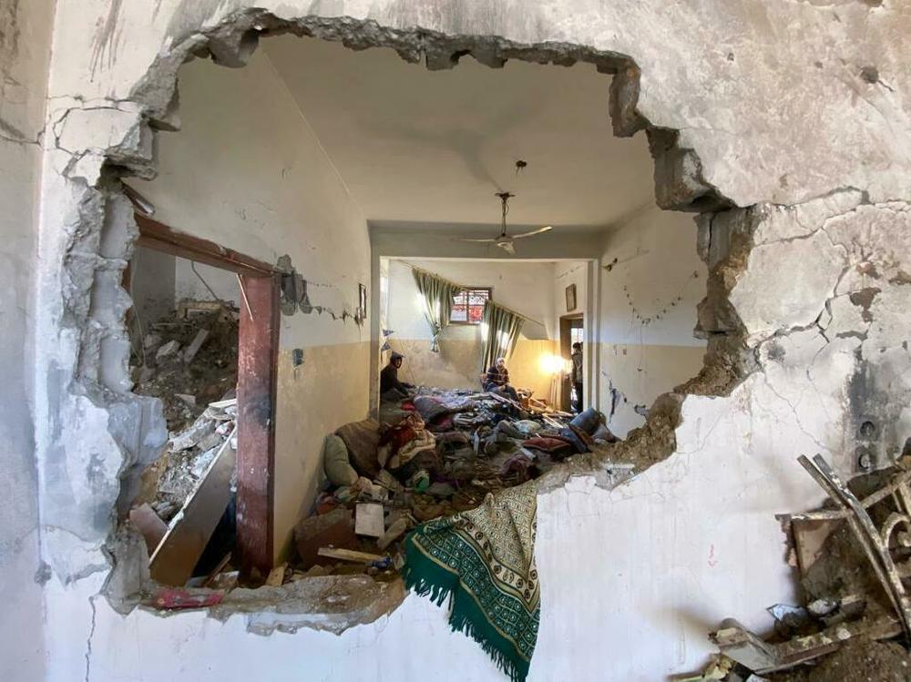 More than 20,000 people have now been killed in Gaza since the start of the war, according to Gaza's Ministry of Health. Above, a home in Rafah is shown in the aftermath of an Israeli airstrike.