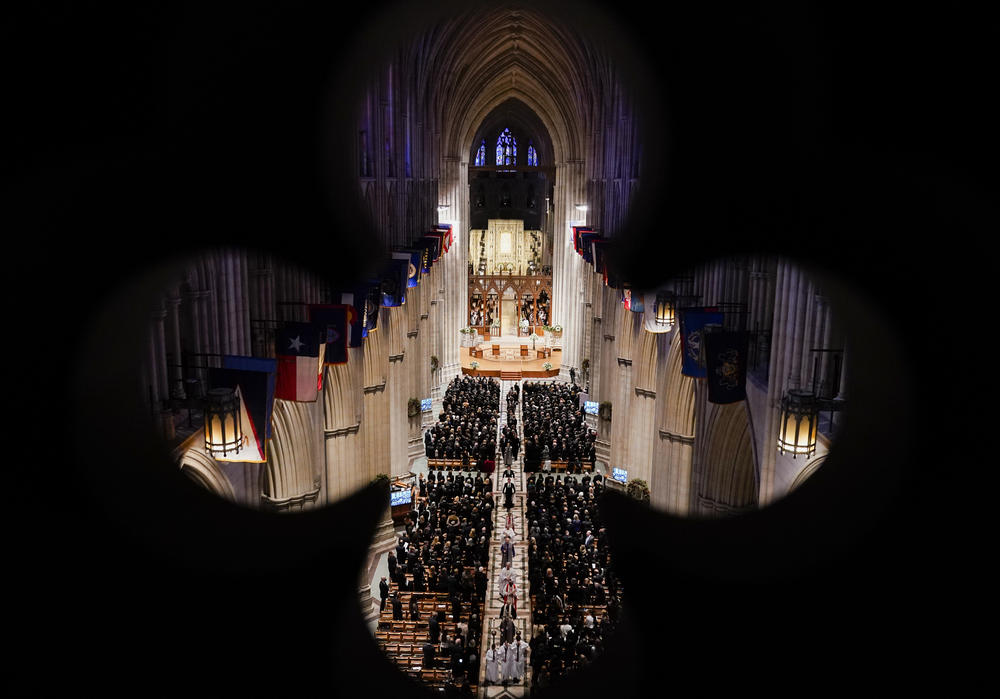 The casket of retired Supreme Court Justice Sandra Day O'Connor is escorted out of the Washington National Cathedral. O'Connor, an Arizona native and the first woman to serve on the nation's highest court, died on Dec. 1 at age 93.
