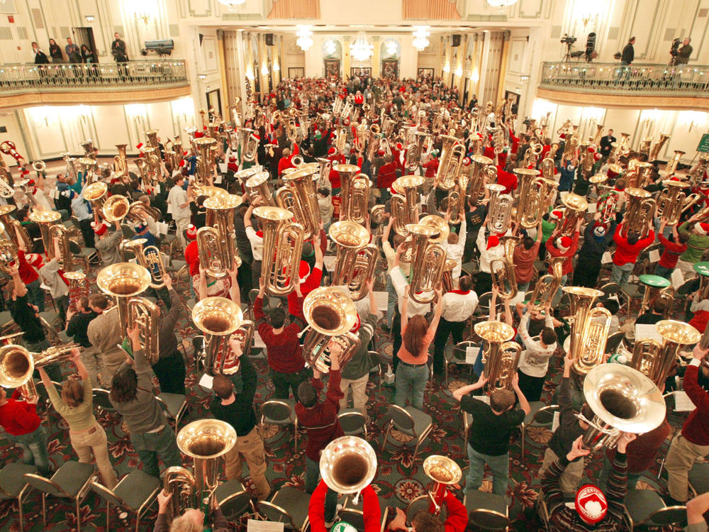 Hundreds of musicians display their tubas after completing TubaChristmas Dec. 18, 2003, in Chicago.