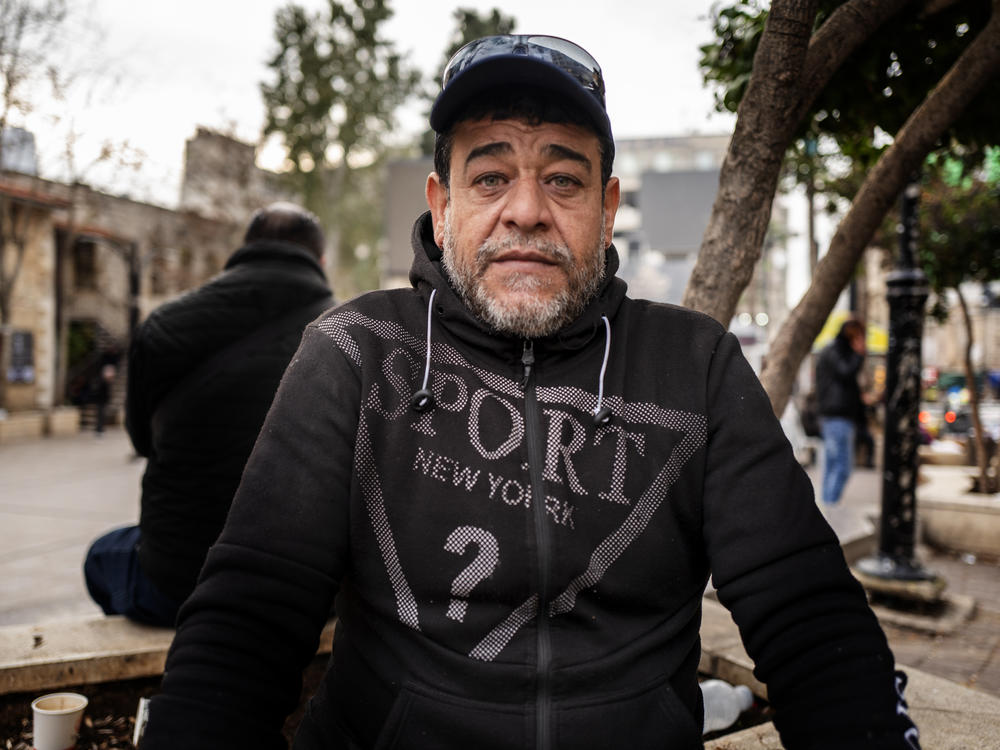 Yousef Es-Sakani is trying to make sense of the airstrike in Gaza City earlier this month that killed his wife, four daughters and two of his sons.