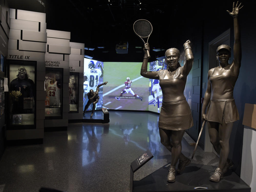 A statue of the Williams sisters, Serena and Venus, is part of the sports exhibit at the National Museum of African American History and Culture in Washington, Wednesday, Sept. 14, 2016.