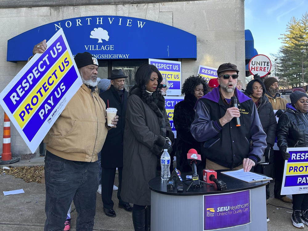 Supporters of Northview Village Nursing Home gather in St. Louis on Tuesday to show support for displaced residents and the employees left jobless by the facility's sudden closure.