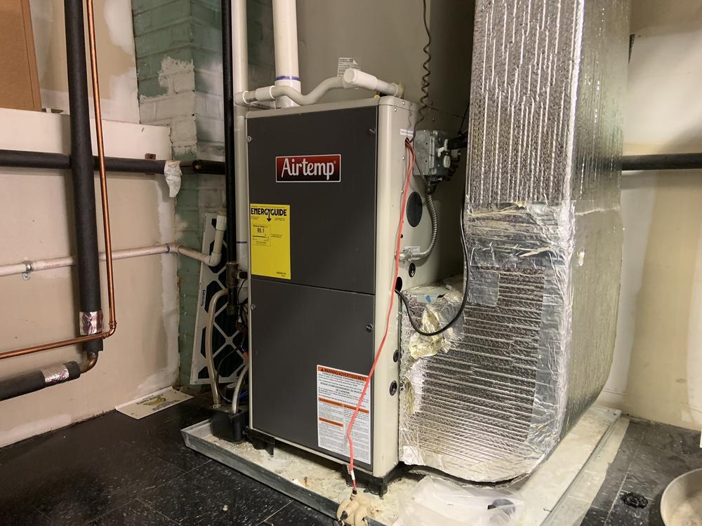 A condensing furnace is used to train installers at the Energy Coordinating Agency in Philadelphia. A yellow 