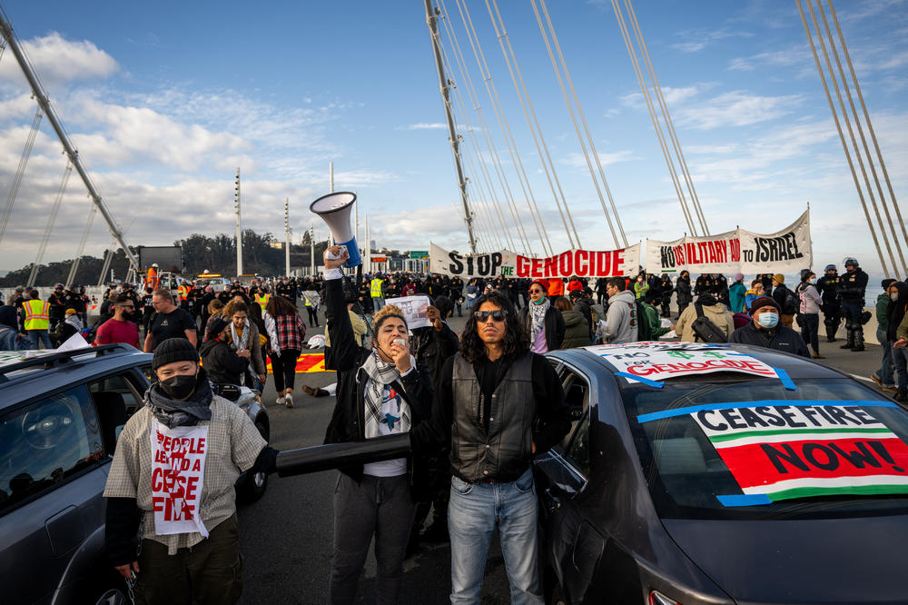 Protesters demanding a cease-fire in Gaza block the westbound lanes of the San Francisco-Oakland Bay Bridge on Nov. 16, 2023. Full story <a href=