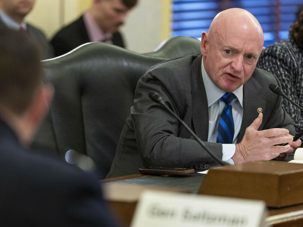 Sen. Mark Kelly, D-Ariz., speaks during a hearing of a Senate Armed Services Committee subcommittee. A combat veteran, Kelly called on the U.S. Marines to explain why wounded troops weren't told the truth about a friendly fire incident in Iraq in 2004.