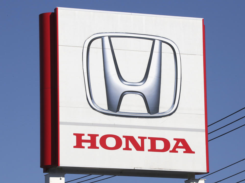 The logo of Honda Motor Co., is seen in Yokohama, near Tokyo on Dec. 15, 2021. Honda Motor's American arm is recalling more than 2.5 million vehicles in the U.S. due to a fuel pump defect that can increase risks of engine failure or stalling while driving.