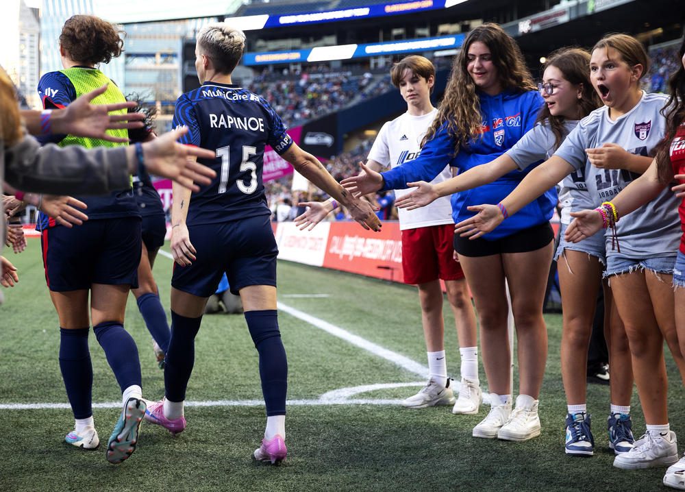 Megan Rapinoe walks onto the field to play her final NWSL regular-season home game against the Washington Spirit on Oct. 6, 2023, at Seattle's Lumen Field. Full story <a href=