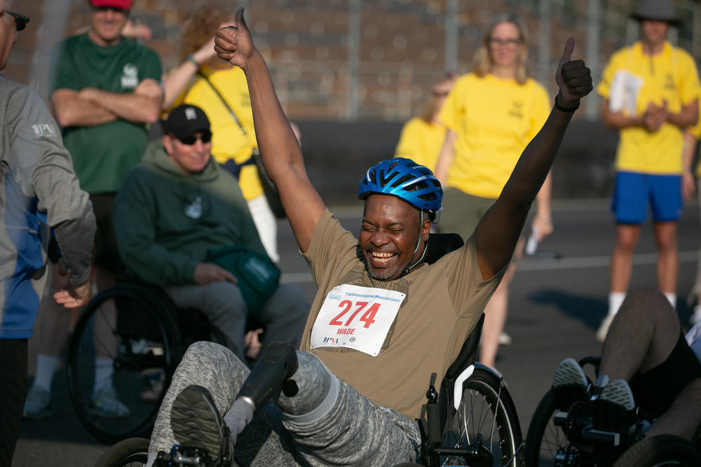 John Wade from Cleveland, Ohio, has a boost of confidence right before the start signal in the National Veterans Wheelchair Games at the Portland International Raceway on July 5, 2023. Full story <a href=