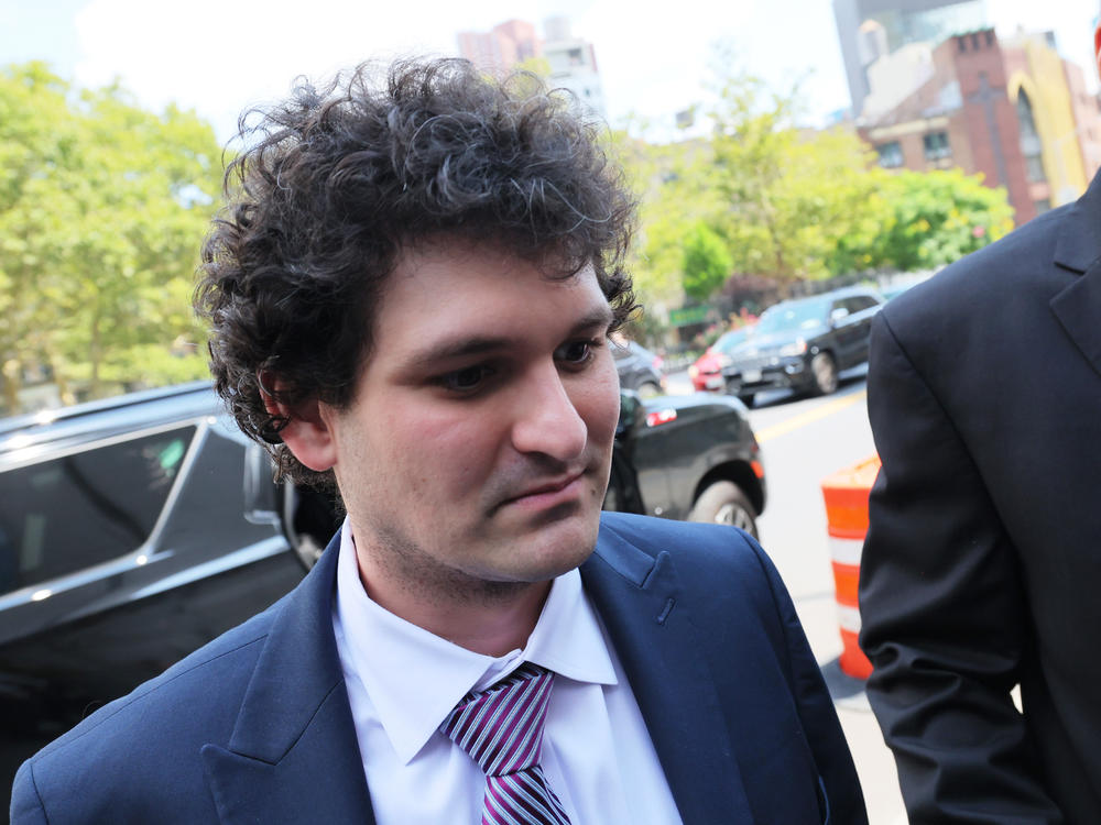 Former FTX CEO Sam Bankman-Fried arrives for a bail hearing at Manhattan Federal Court in New York City on Aug. 11, 2023. Two of the most prominent crypto players faced legal trouble this year. Bankman-Fried was convicted of all criminal charges and faces the prospect of a lifetime in prison. Meanwhile Binance CEO Changpeng Zhao pleaded guilty to violating anti-money laundering rules.