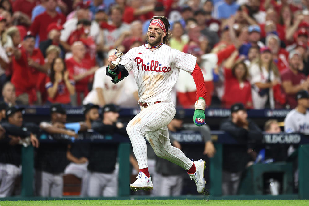 Bryce Harper of the Philadelphia Phillies sprints home during a game against the Miami Marlins on Oct. 3, 2023.