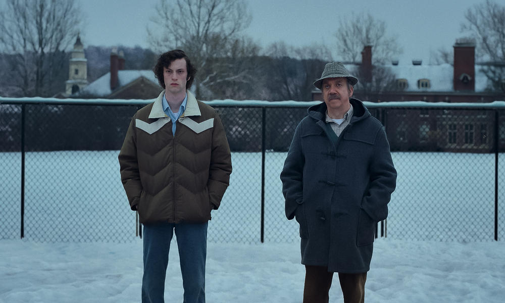 Dominic Sessa, left, and Paul Giamatti in <em>The Holdovers. </em><strong><a href=