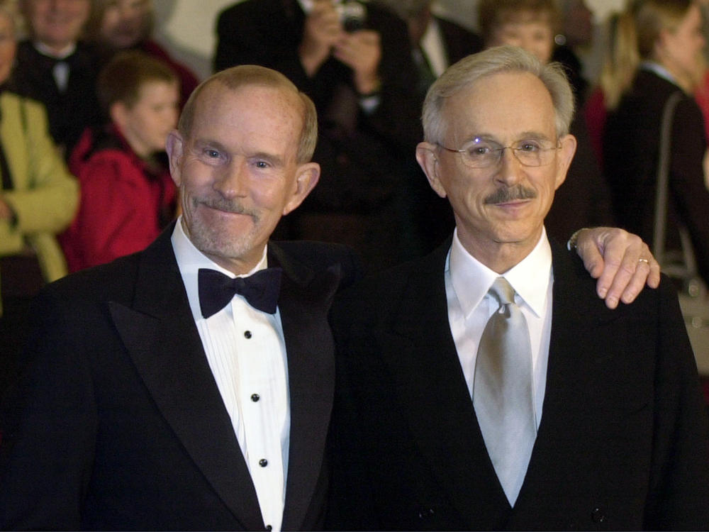 The Smothers Brothers, Tom (left) and Dick, appear at the Kennedy Center in Washington for the Mark Twain Prize for Humor Award ceremony honoring Bob Newhart on Oct. 29, 2002.